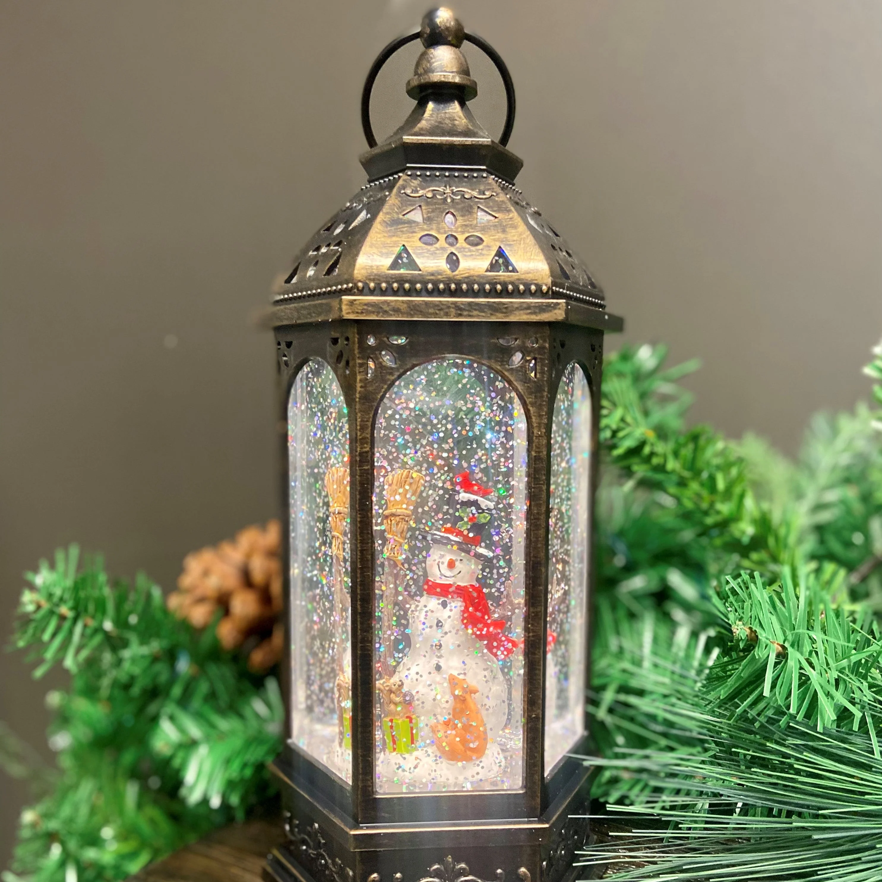 Snowburst Lantern with Snowman and Glittering Light Snow Show - Image 3