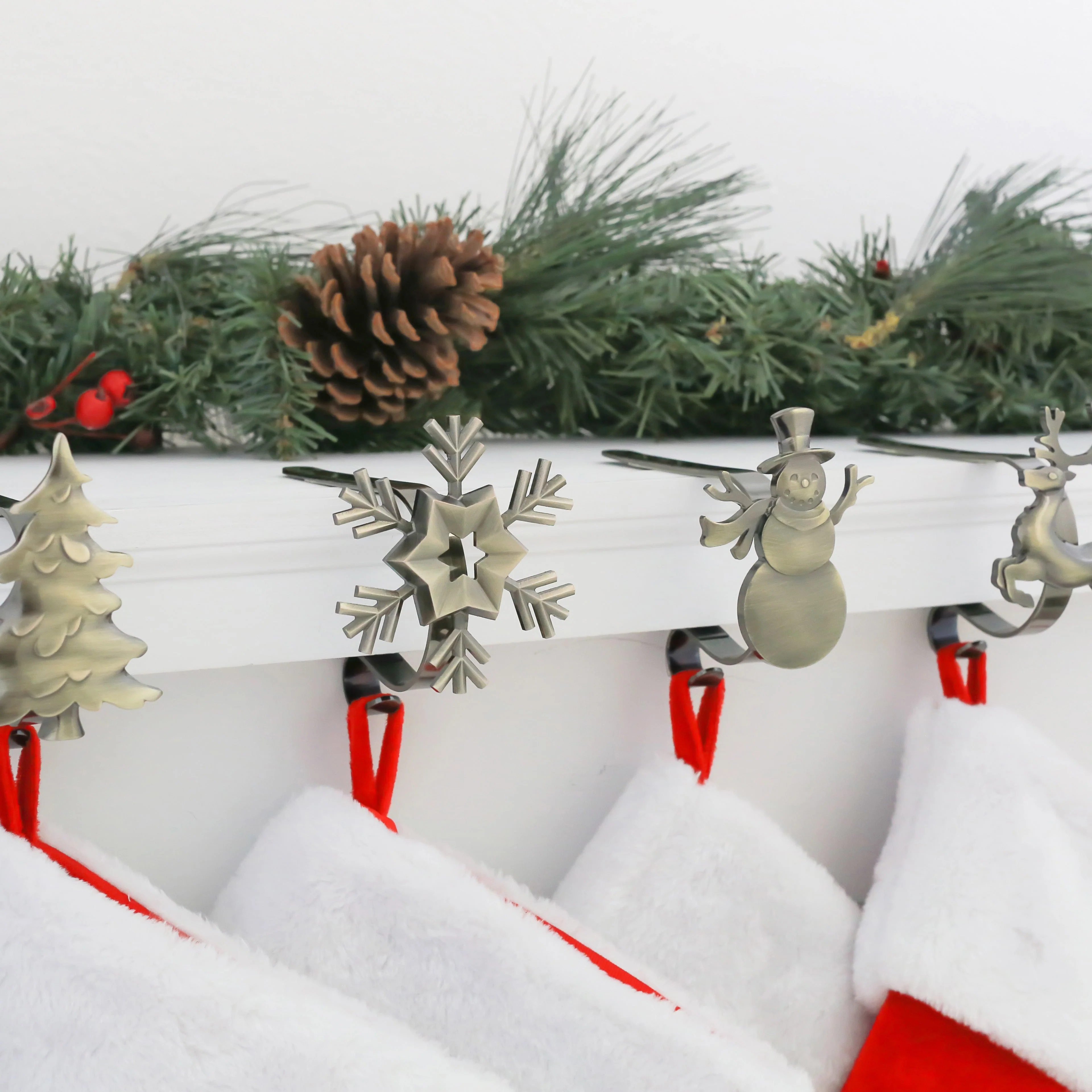 The Original MantleClip Stocking Holder with Removable Metal Holiday Icons, 4 Pack - Assorted Antique Brass - Image 2